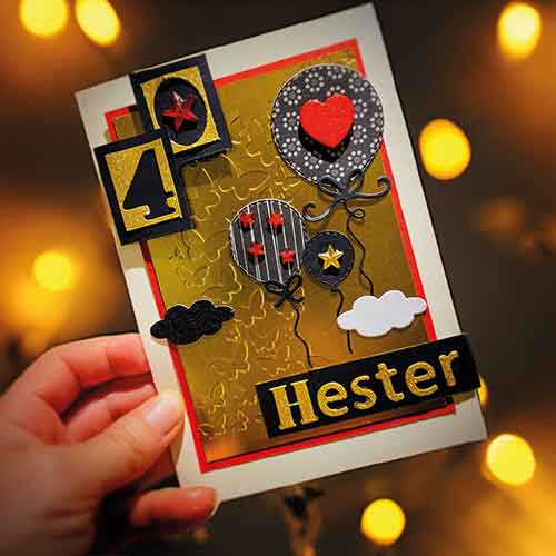 Geburtstagskarte zum 40. Geburtstag. Im Hintergrund leuchten goldene Punkte.